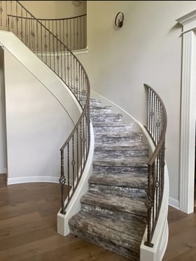 Curved carpeted staircase