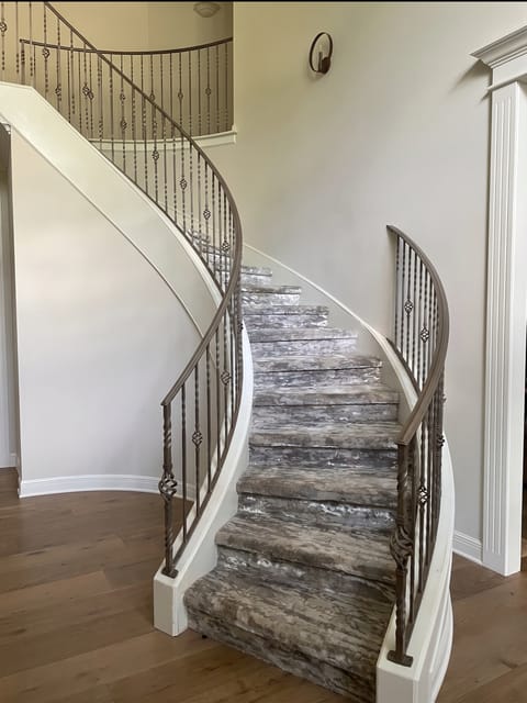 Curved carpeted staircase